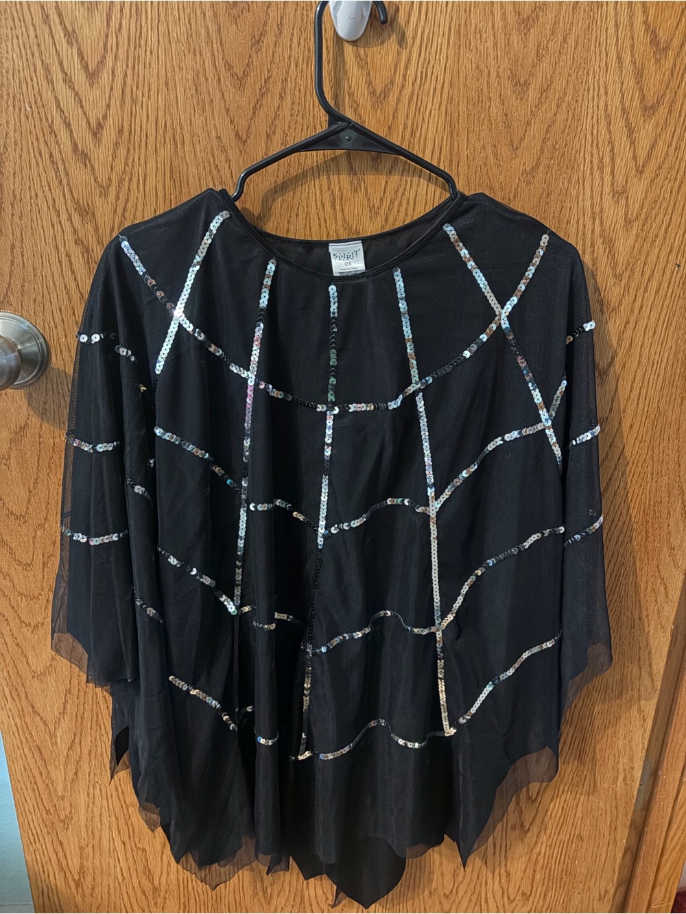 Women’s spider web poncho